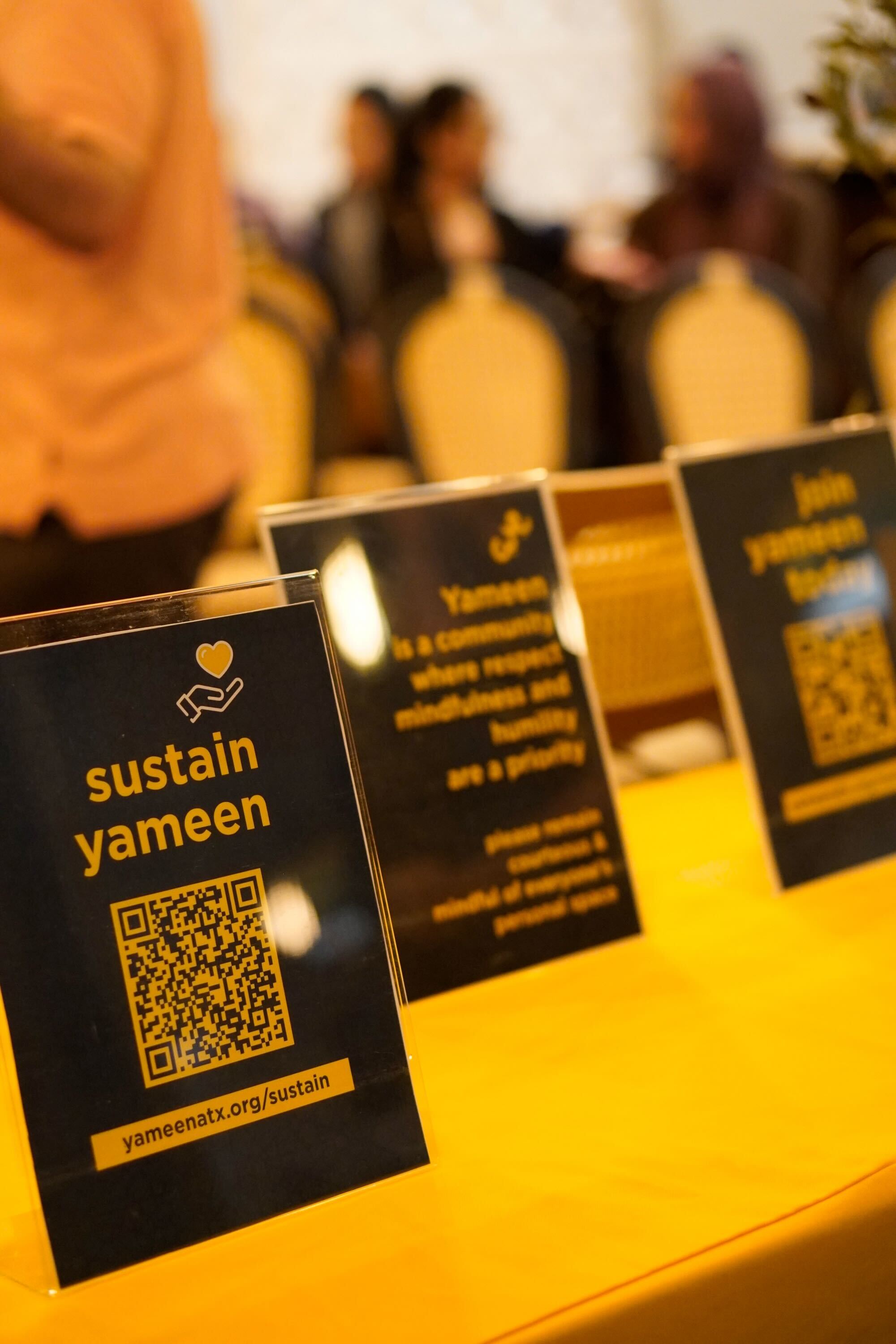 Sustain Yameen card at a gathering